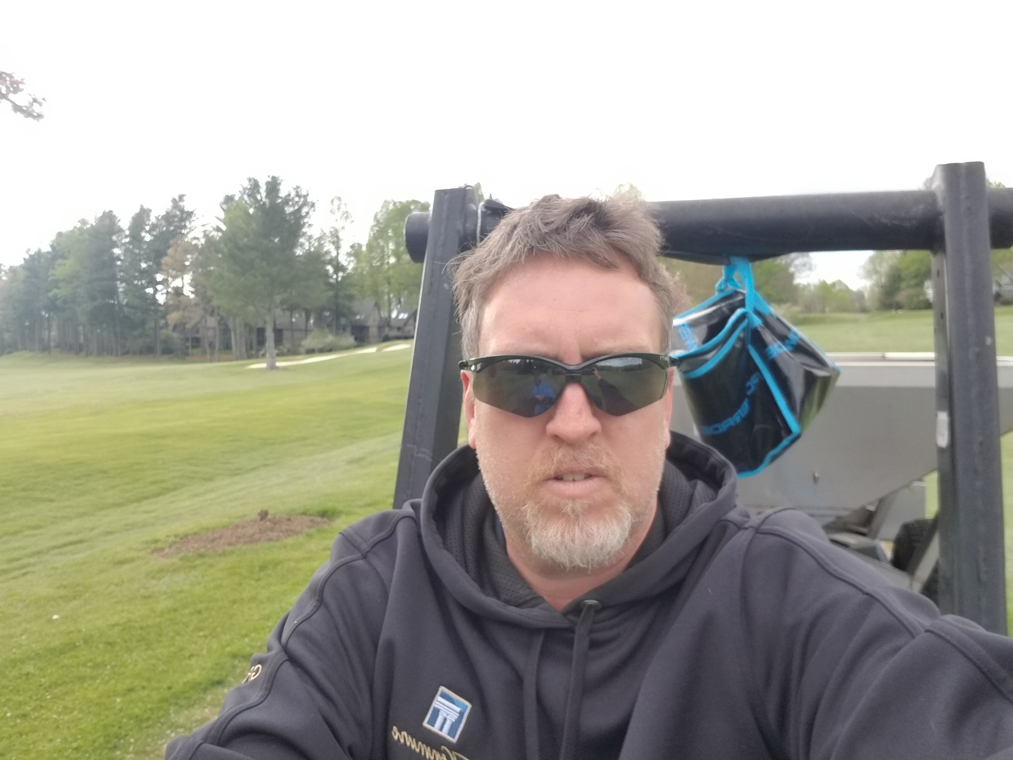 Josh addressing the crew near maintenance equipment